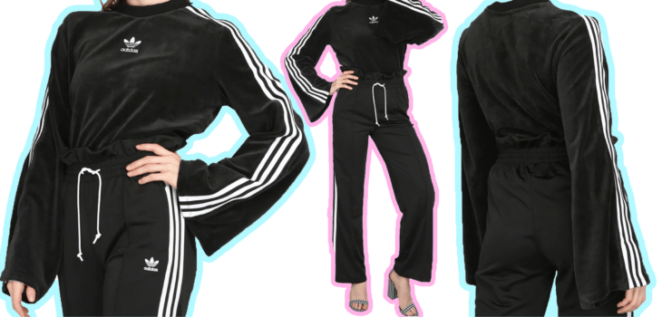 Chica usando un conjunto adidas de color negro con tacones