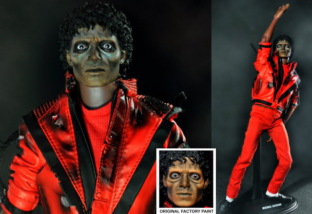 muñeco de michael jackson caracterizado como zombie usando una chamarra roja 