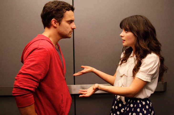 escena de la serie new girl nick y jess peleando 