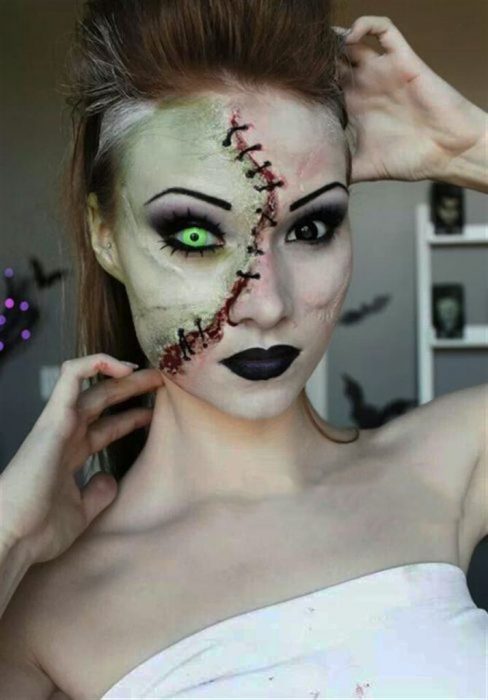 Chica con maquillaje para halloween como zombie sin la mitad de la cara 