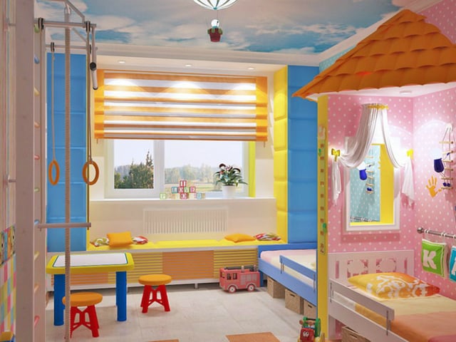 cuarto de niño y niña dividido por una pared en forma de palapa de color rosa y azul 