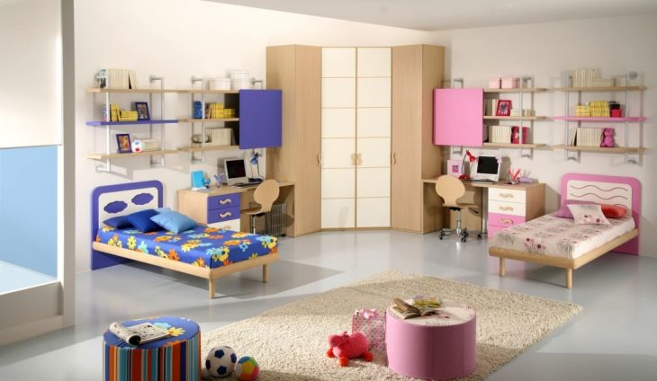 Cuarto de niño y niña divididos por un mueble 