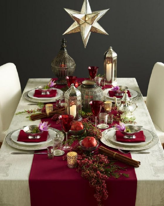 Decoración de mesa con estrellas y manzanas 