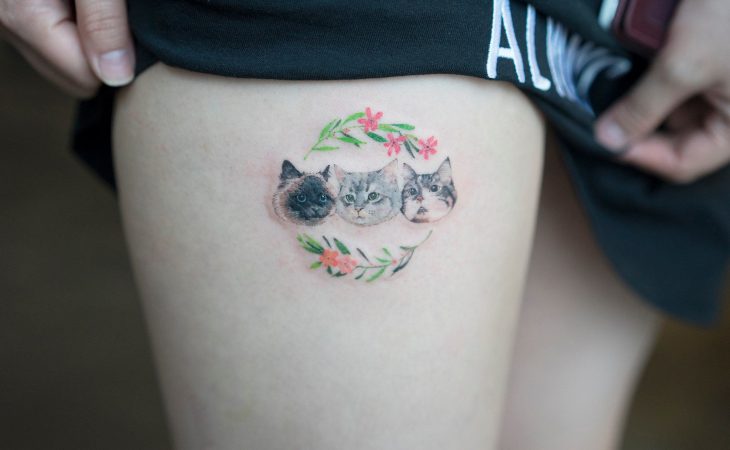 Tatuaje cabezas de gato 