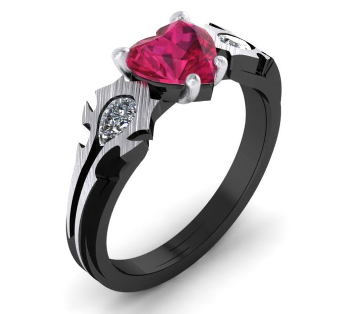 anillo de compromiso con una piedra rosa 