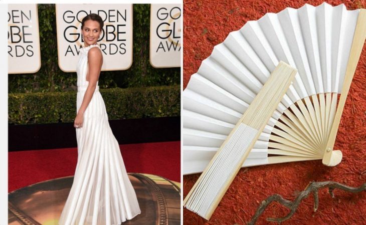 Vestido de Alicia vikander comparada con un ventilador de acordeón