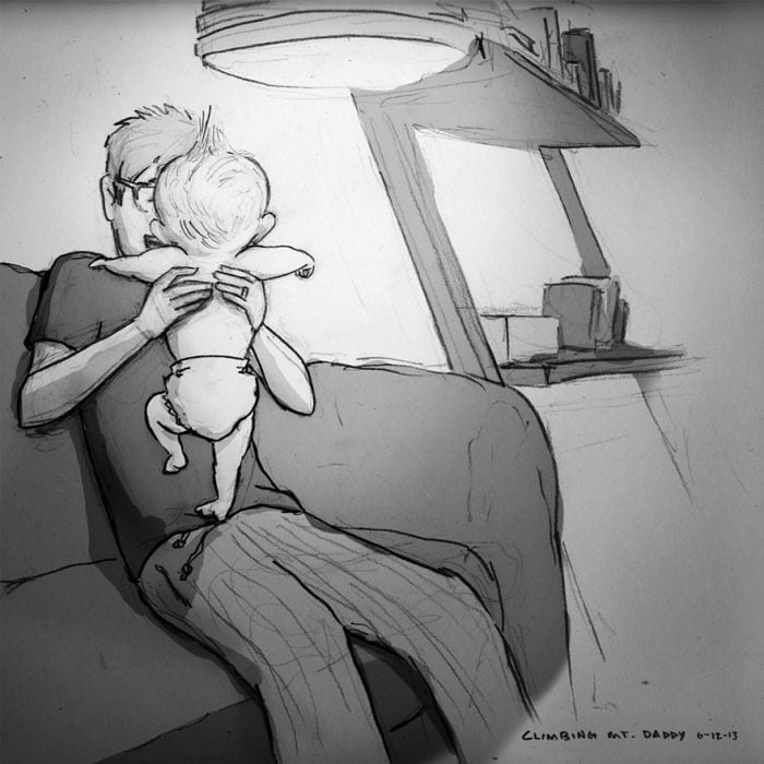 papá con bebé en brazos