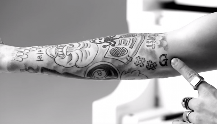 tatuaje de justin bieber G antebrazo 