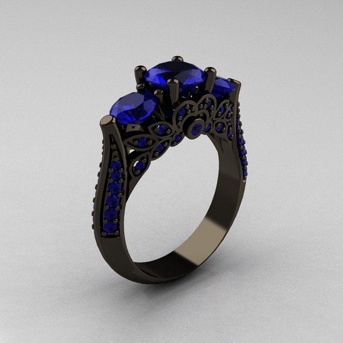 anillo de compromiso negro piedra azul