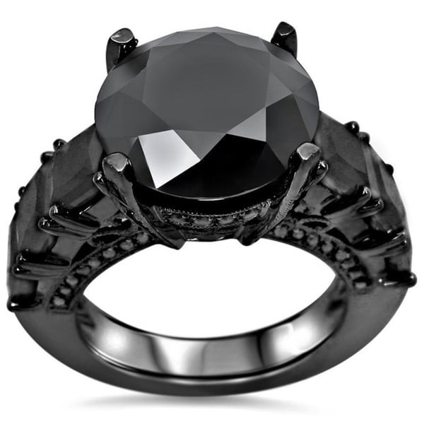 anillo de compromiso negro piedra azul
