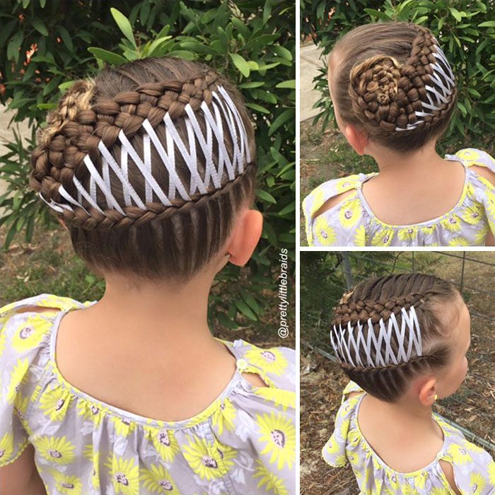 Niña con el cabello trenzado con listones