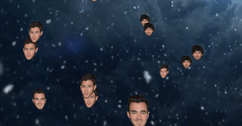 gif cabezas de jonas brothers flotando con copos de nieve 