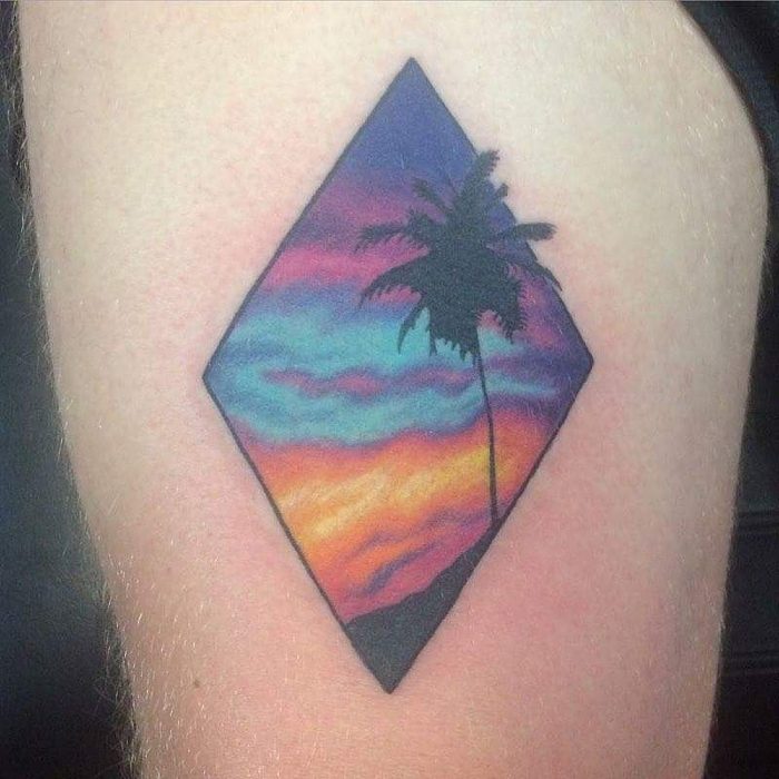 Tatuaje paisaje del atardecer en la playa 