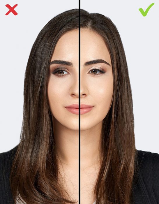 mujer cabello largo y saco negro y sombras oscuras 