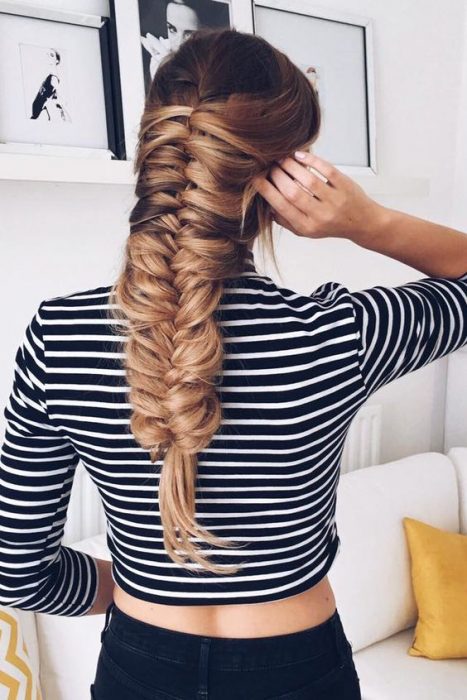 Chica con el cabello trenzado 