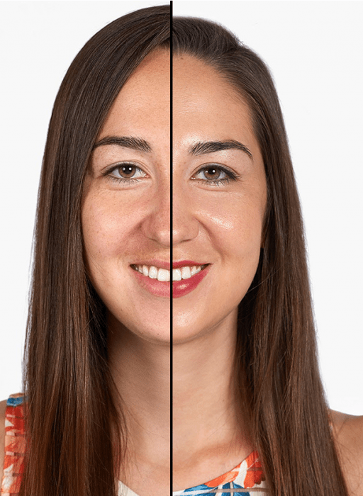 mujer de cabello castaño largo sonrie mitad de su cara maquillada