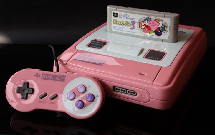 super nintendo color rosa con control botones morados 