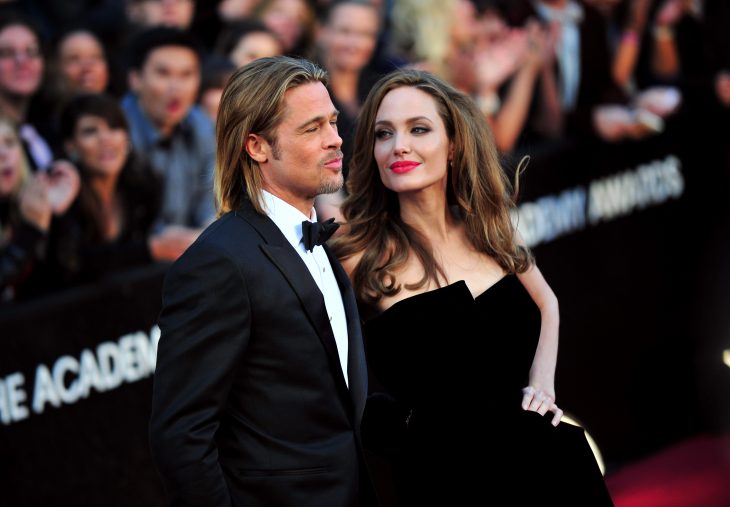 Angelina Jolie y Brad Pitt en alfombra roja. 