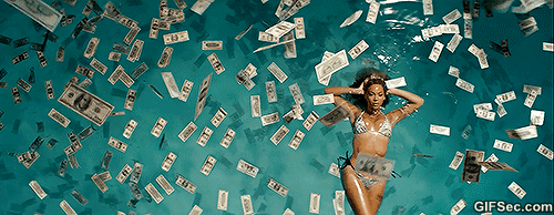 Beyoncé bañándose en billetes. 
