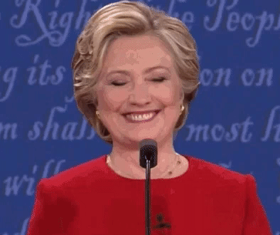 Hillary Clinton sonriendo. 