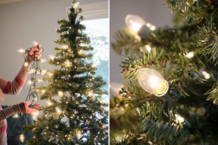 árbol de navidad con serie de luces navideñas 