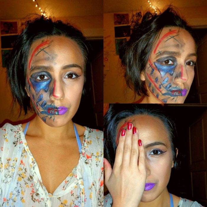 Mujer con un lado de su rostro maquillado de forma trágica 