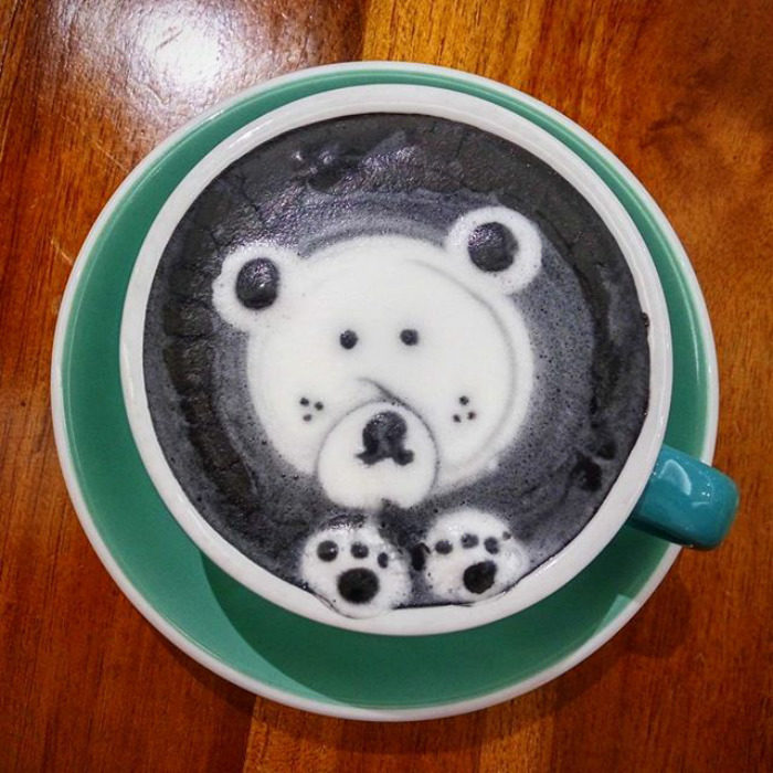 tazas de café negras con oso