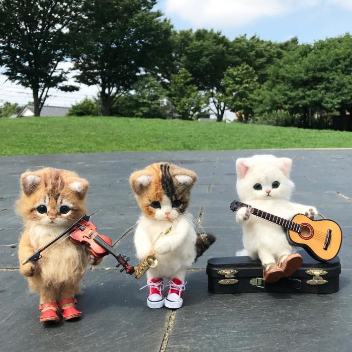 Trio musical de gatos de lana