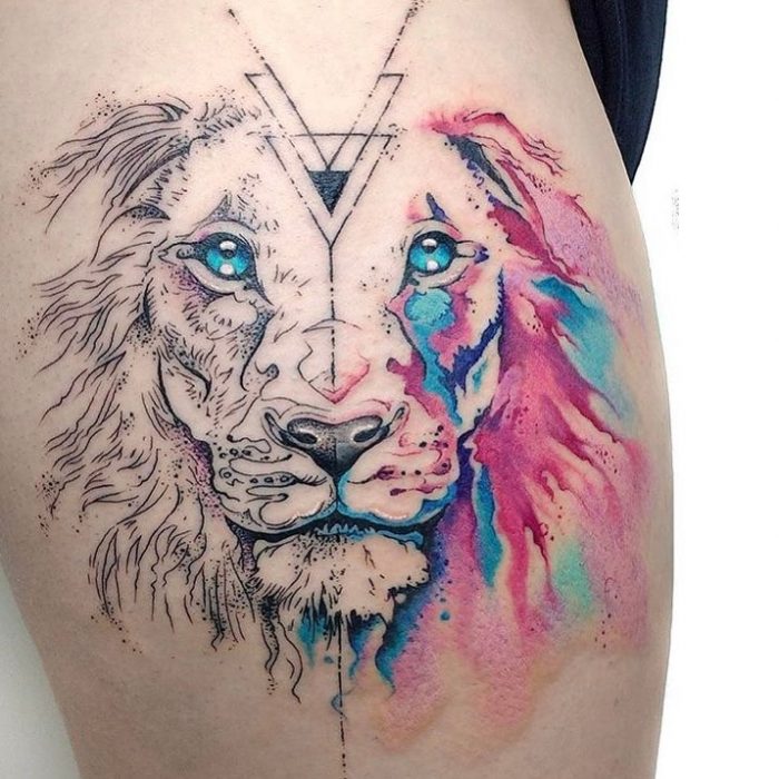 tatuaje de león con cara partida