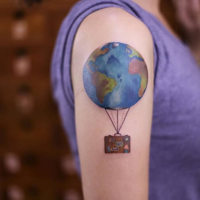 tatuaje de globo terráqueo 