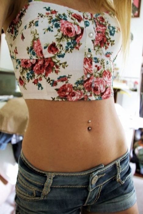 Girl with a navel piercing