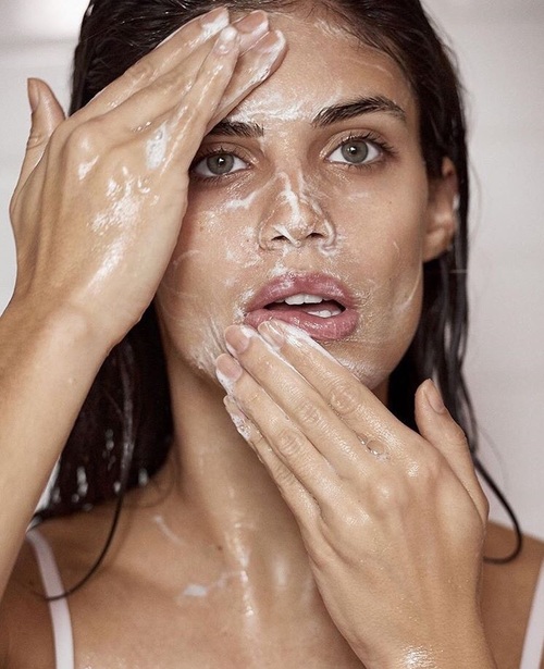 girl washing her face