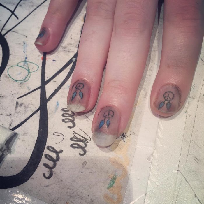 fingernail tattoos