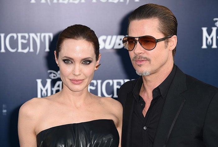 Angelina Jolie y Brad Pitt en una alfombra roja