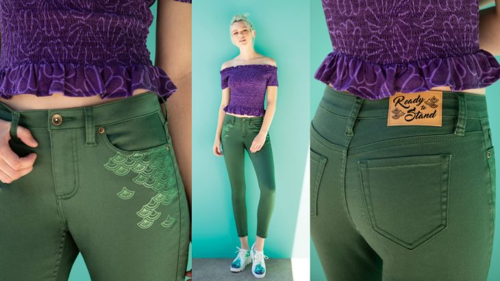 mujer con jeans color verde y blusa morada 