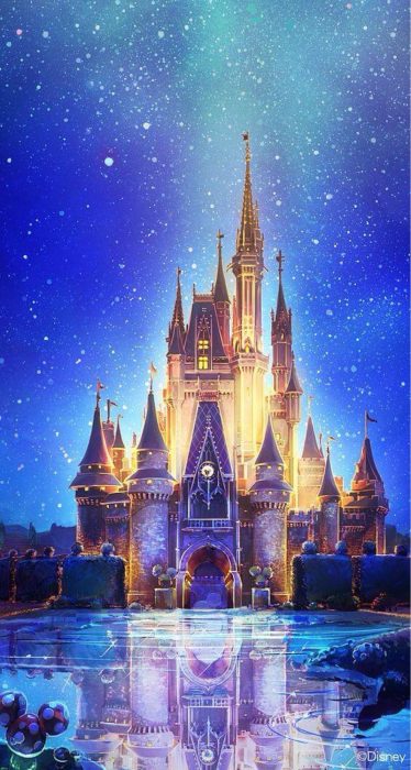 Fondo de pantalla de celular que tiene el castillo de Disney iluminado con colores blancos y azules 