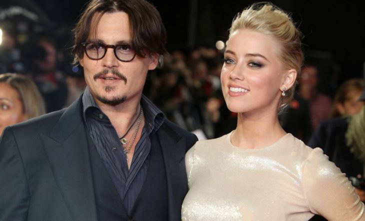 Johnny Depp y Amber Heard en una gala 