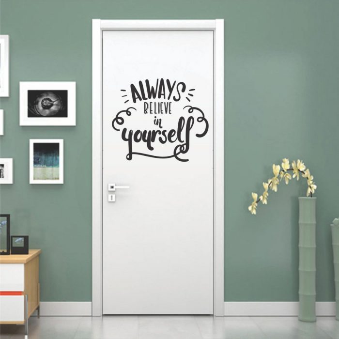 Door of a room decorated with a vinyl that says "Always belived in yourself" 