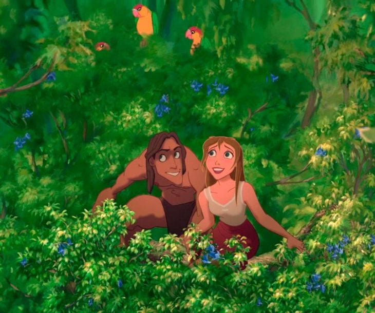 Dibujo animado de Jane y Tarzán en medio de la selva viendo aves volar, escena de la película Tarzán