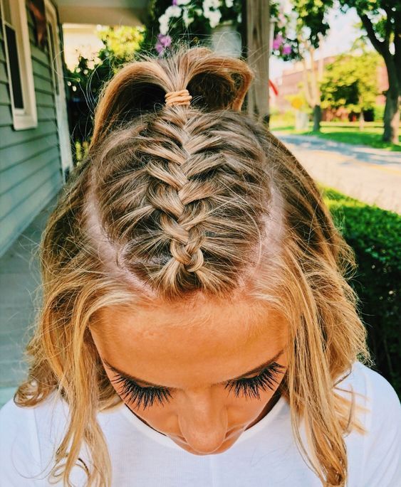 Woman combed with braid on her head