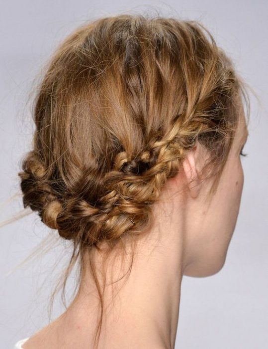 Redhead girl with braid hairstyle messy style