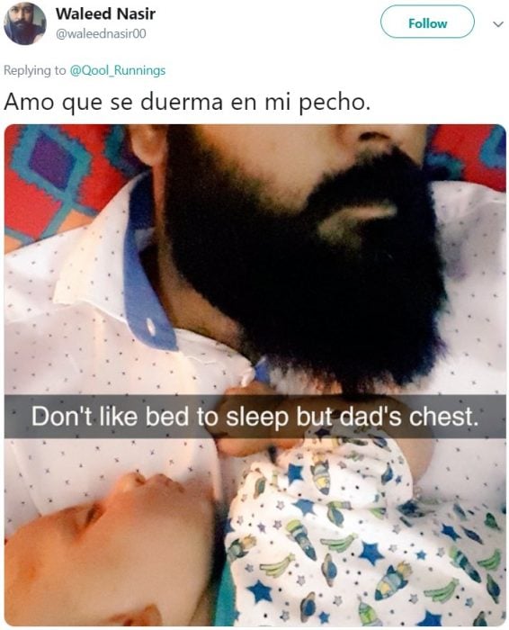 Bebé dormido en el pecho de su papá con barba tupida