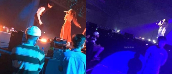 Ariana Grande cantando mientras Mac Miller la ve desde abajo del escenario