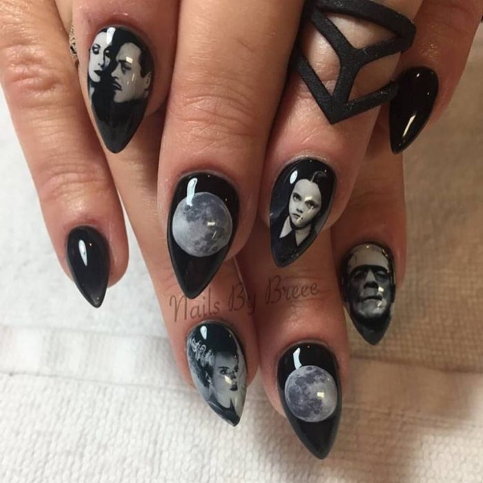 Uñas con manicura estilo bruja para Halloween; los locos Addams; stiletto