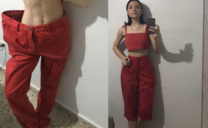 Chica con unos pantalones grandes y modificados ceñidos al cuerpo y con un crop top 