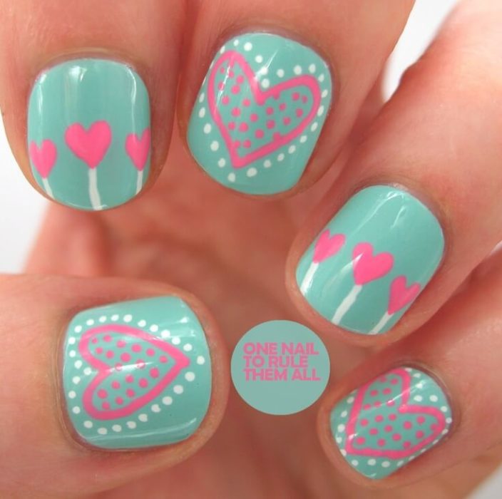 Diseños de uñas en color rosa y rojo para festejar san valentín