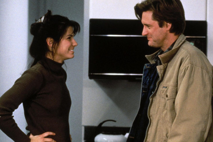 Escena de la película mientras dormias en la que participan Bill Pullman y Sandra Bullock