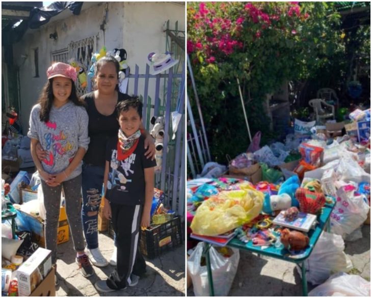 Familia reunida en el frente se su casa recibiendo ayuda de despensa