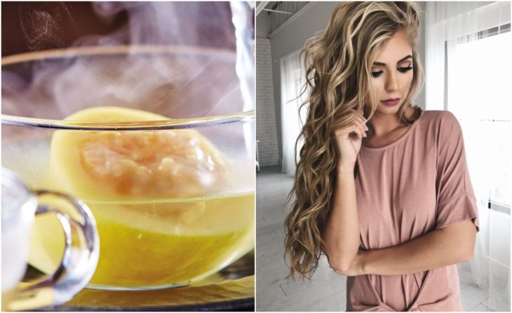 Chica de cabello largo junto a una taza de té de hojas de guayaba