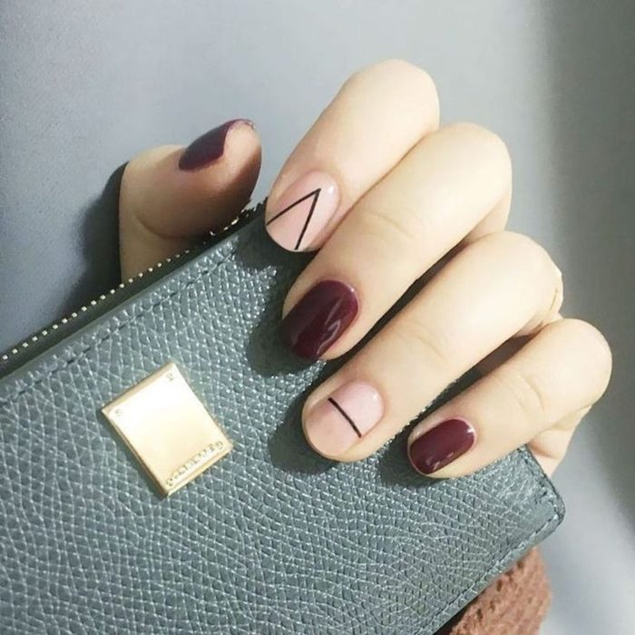 Manicura en colores vino y roa pastel